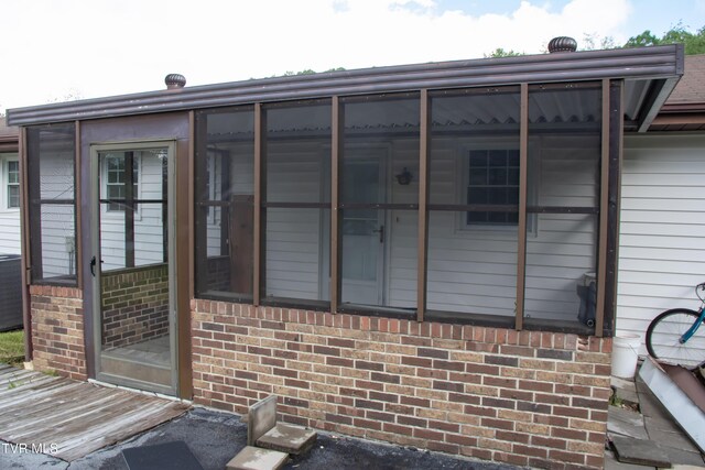 7324 White Pine Cir, Bristol, VA 24202 - view of property exterior featuring brick siding and a sunroom