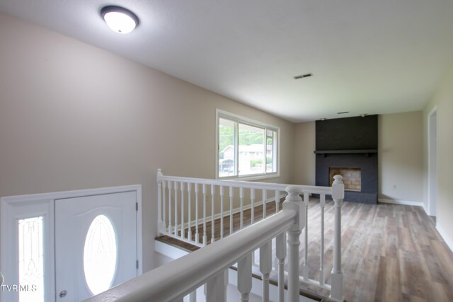 7324 White Pine Cir, Bristol, VA 24202 - hall featuring wood finished floors, an upstairs landing, and baseboards