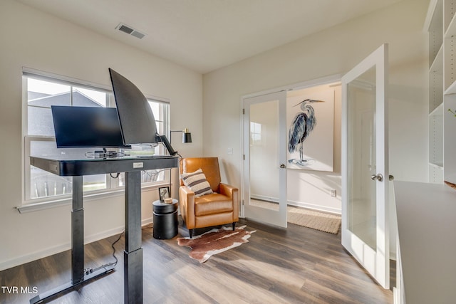 2340 Hamshire St, Johnson City, TN 37601 - sitting room with wood finished floors, baseboards, and french doors