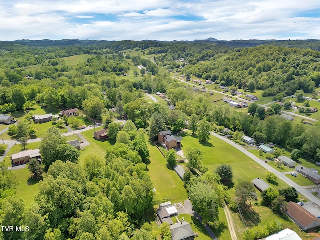 drone / aerial view of a heavily wooded area