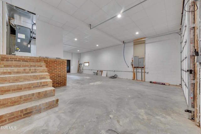basement featuring electric panel