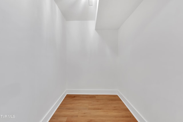 walk in closet featuring light wood-style flooring