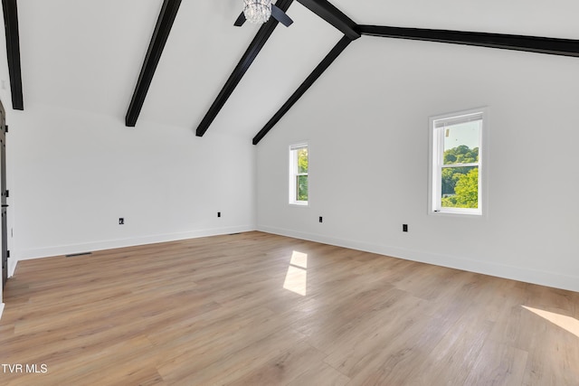 unfurnished living room with ceiling fan, baseboards, and light wood finished floors