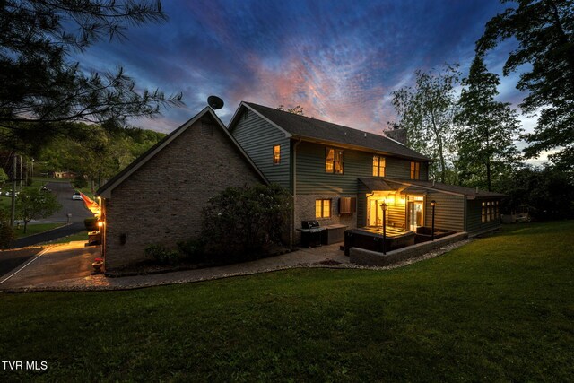588 Spring Valley Rd, Bristol, VA 24201 - back of house featuring a chimney and a lawn