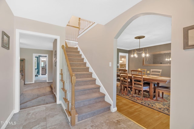 588 Spring Valley Rd, Bristol, VA 24201 - stairway featuring arched walkways and baseboards