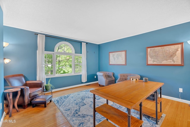 588 Spring Valley Rd, Bristol, VA 24201 - office area featuring baseboards, light wood-style flooring, and crown molding