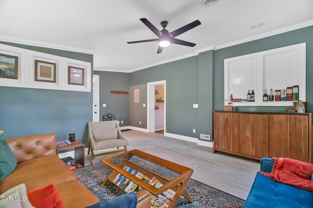 588 Spring Valley Rd, Bristol, VA 24201 - living room with ceiling fan, crown molding, baseboards, and a bar