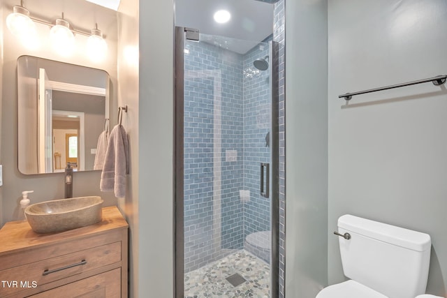 588 Spring Valley Rd, Bristol, VA 24201 - bathroom featuring a stall shower, toilet, and vanity