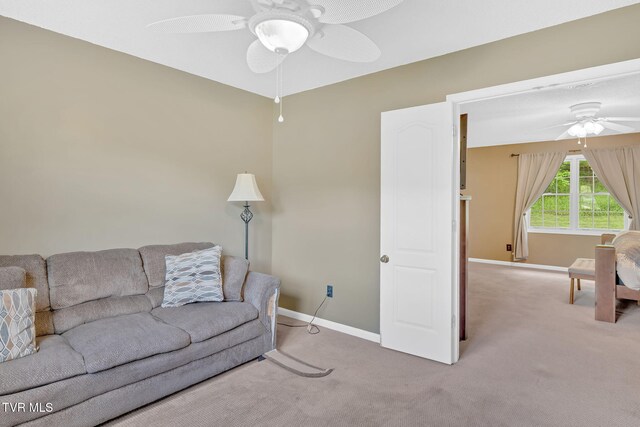 588 Spring Valley Rd, Bristol, VA 24201 - carpeted living room with ceiling fan and baseboards