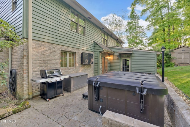 588 Spring Valley Rd, Bristol, VA 24201 - view of patio featuring a hot tub, a grill, a shed, and an outdoor structure