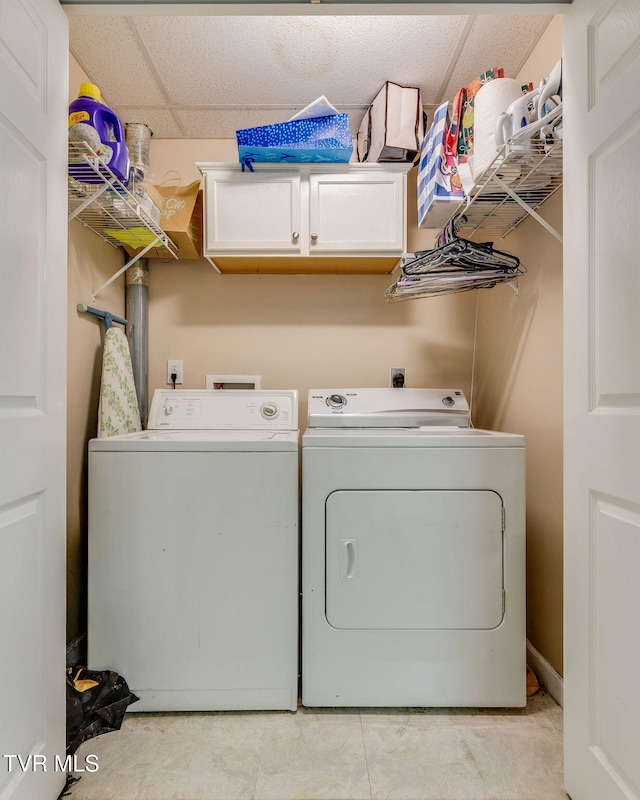 laundry room with cabinet space and washer and dryer