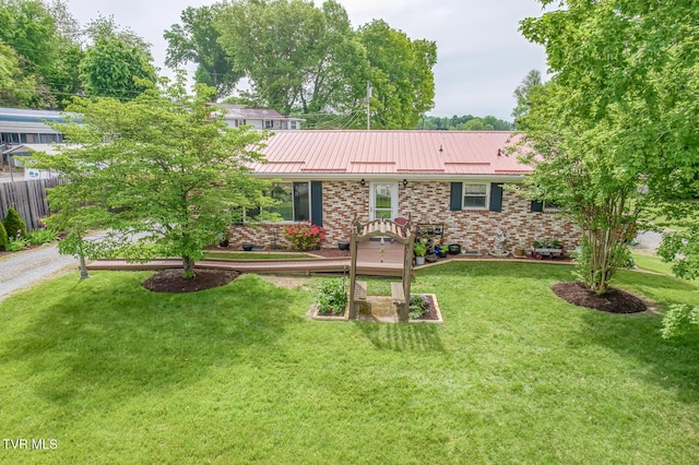 629 Buffalo Rd, Blountville, TN 37617 - view of front of house with brick siding, metal roof, and a standing seam roof