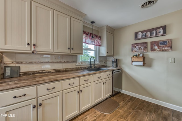 629 Buffalo Rd, Blountville, TN 37617 - kitchen featuring a sink, stainless steel dishwasher, backsplash, and dark wood-style floors