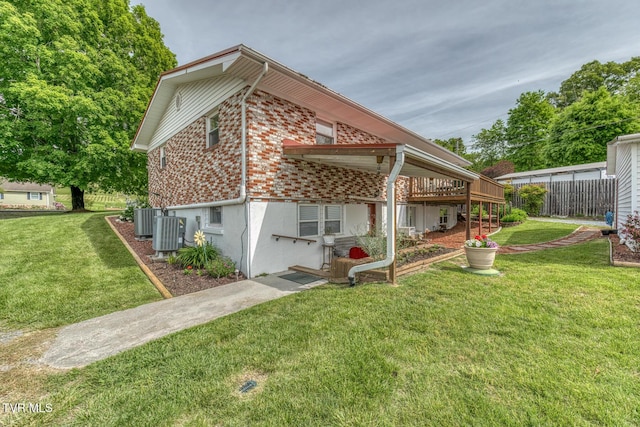 629 Buffalo Rd, Blountville, TN 37617 - back of property with brick siding, cooling unit, and a deck