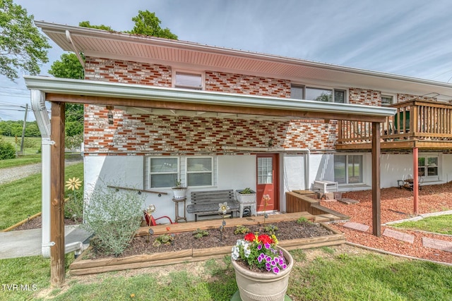 629 Buffalo Rd, Blountville, TN 37617 - view of front of house featuring brick siding, a deck, and a garden