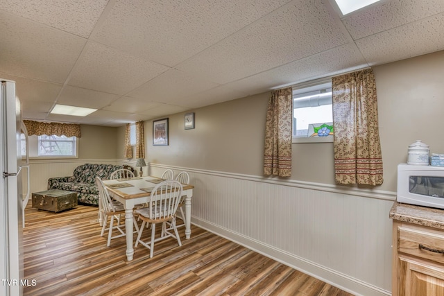 629 Buffalo Rd, Blountville, TN 37617 - dining room featuring a drop ceiling, wood finished floors, and wainscoting