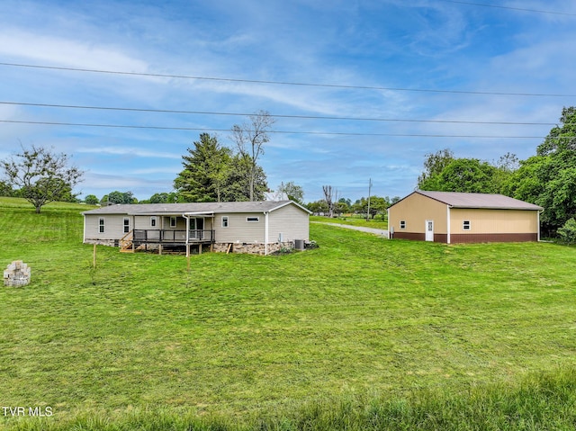 2551 Cedar Creek Rd, Russellville, TN 37860 - view of green lawn with a deck and central AC
