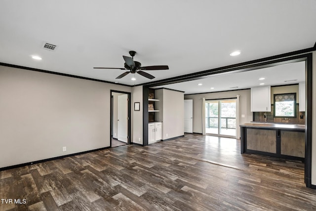 2551 Cedar Creek Rd, Russellville, TN 37860 - unfurnished living room with dark wood-style flooring, ornamental molding, baseboards, a ceiling fan, and recessed lighting