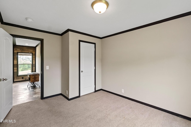 2551 Cedar Creek Rd, Russellville, TN 37860 - unfurnished bedroom featuring light carpet, baseboards, and crown molding