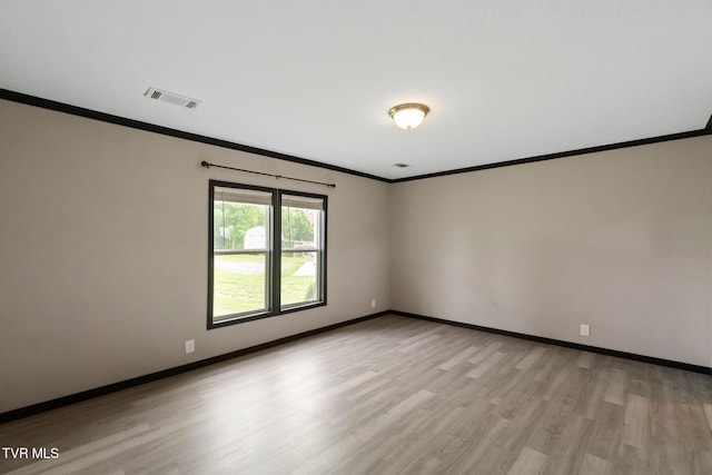2551 Cedar Creek Rd, Russellville, TN 37860 - unfurnished room featuring crown molding, light wood finished floors, and baseboards
