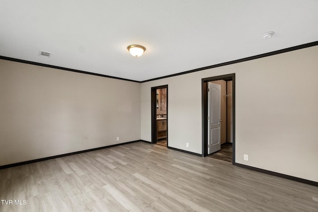 2551 Cedar Creek Rd, Russellville, TN 37860 - spare room featuring ornamental molding, light wood finished floors, baseboards, and a smoke detector