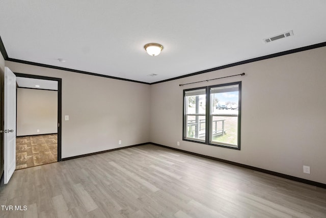 2551 Cedar Creek Rd, Russellville, TN 37860 - empty room featuring ornamental molding, light wood-style flooring, baseboards, and a smoke detector