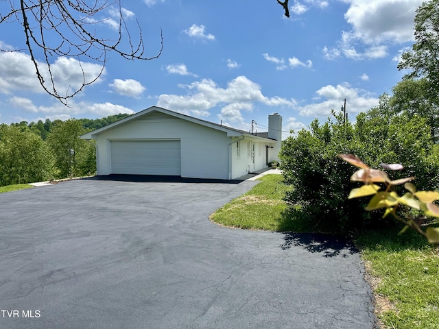 8467 Rich Valley Rd, Bristol, VA 24202 - view of home's exterior with a chimney