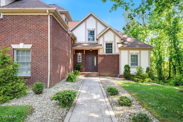 15127 Stonewall Rdg, Bristol, VA 24202 - tudor house featuring stucco siding, brick siding, and roof with shingles