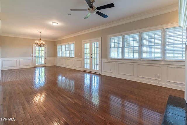 15127 Stonewall Rdg, Bristol, VA 24202 - empty room featuring a chandelier, a decorative wall, dark wood-style flooring, ceiling fan, and ornamental molding