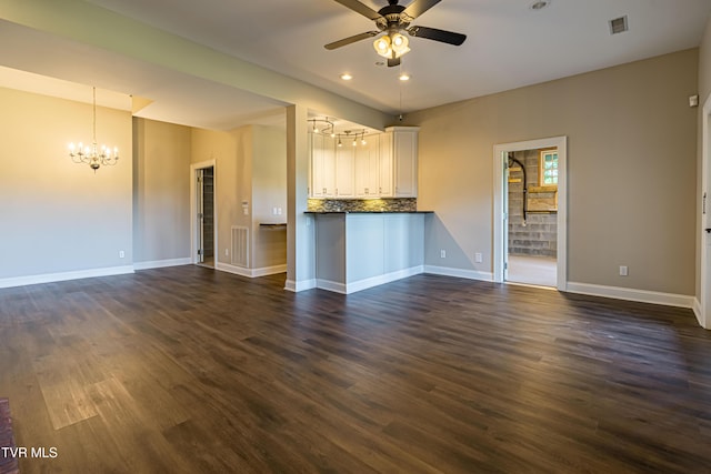 15127 Stonewall Rdg, Bristol, VA 24202 - unfurnished living room featuring a chandelier, dark wood finished floors, a ceiling fan, and recessed lighting