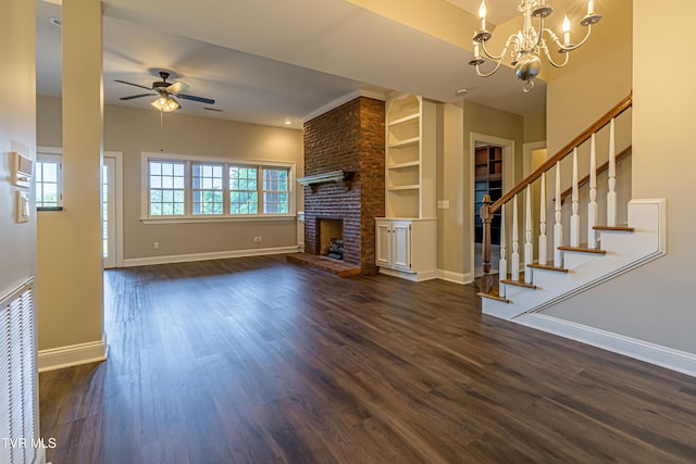 15127 Stonewall Rdg, Bristol, VA 24202 - unfurnished living room with ceiling fan, a brick fireplace, dark wood finished floors, a chandelier, and stairway