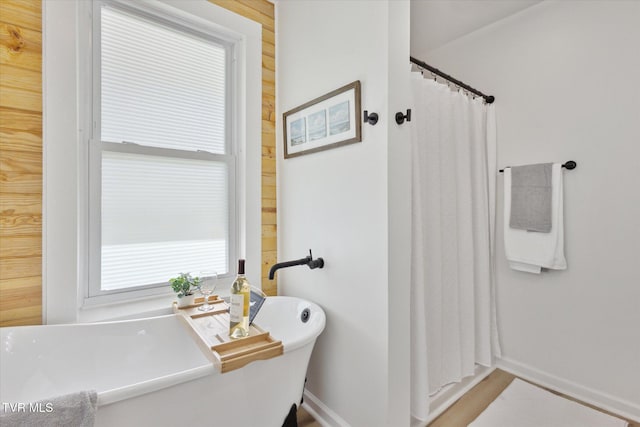 2504 Fort Henry Dr, Kingsport, TN 37664 - full bathroom with baseboards, a freestanding bath, and curtained shower