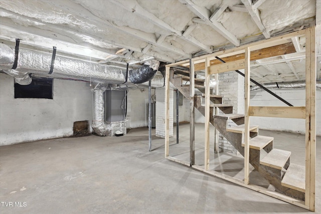 2504 Fort Henry Dr, Kingsport, TN 37664 - unfinished basement featuring stairway, water heater, and heating unit