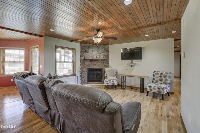 138 Ray Cemetery Rd, Roan Mountain, TN 37687 - living area with ceiling fan, a stone fireplace, wood ceiling, and wood finished floors