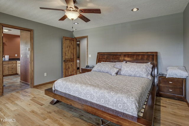 138 Ray Cemetery Rd, Roan Mountain, TN 37687 - bedroom featuring light wood-style flooring, baseboards, a textured ceiling, recessed lighting, and ceiling fan