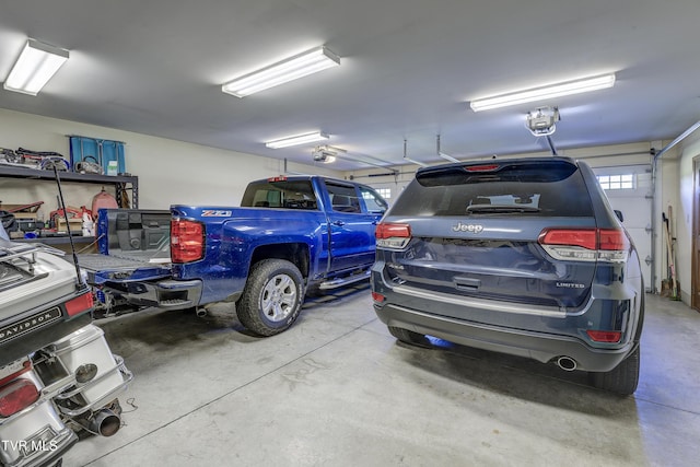 138 Ray Cemetery Rd, Roan Mountain, TN 37687 - garage featuring a garage door opener
