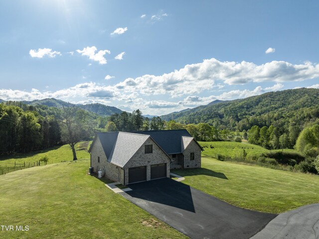 138 Ray Cemetery Rd, Roan Mountain, TN 37687 - view from above of property with mountains and a heavily wooded area
