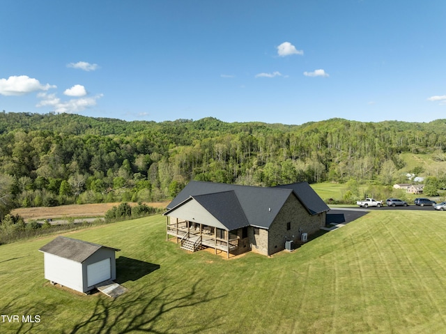 138 Ray Cemetery Rd, Roan Mountain, TN 37687 - aerial view of property and surrounding area with a heavily wooded area