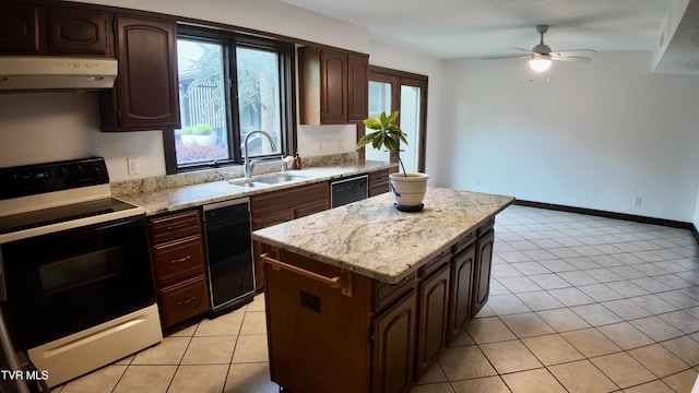 15 Crown Cir Unit 15, Kingsport, TN 37660 - kitchen with range with electric stovetop, under cabinet range hood, a sink, and healthy amount of natural light