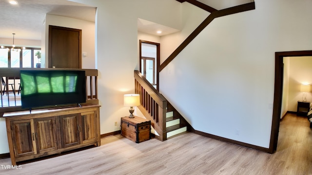 15 Crown Cir Unit 15, Kingsport, TN 37660 - living area featuring light wood-type flooring, baseboards, recessed lighting, stairs, and a chandelier