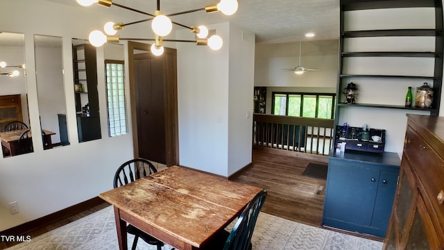 15 Crown Cir Unit 15, Kingsport, TN 37660 - dining room featuring a ceiling fan, baseboards, wood finished floors, and a chandelier