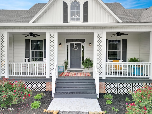 1905 Martin Rd, Limestone, TN 37681 - view of exterior entry featuring ceiling fan, covered porch, and board and batten siding