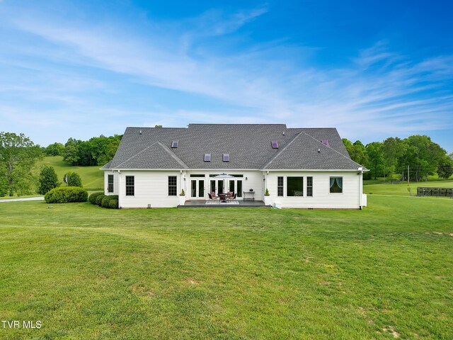 1905 Martin Rd, Limestone, TN 37681 - rear view of property with a patio, a lawn, and roof with shingles