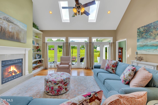 1905 Martin Rd, Limestone, TN 37681 - living area with high vaulted ceiling, french doors, plenty of natural light, a tile fireplace, and recessed lighting