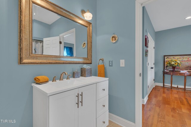 1905 Martin Rd, Limestone, TN 37681 - bathroom with wood finished floors, baseboards, and vanity