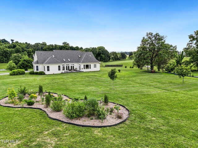 1905 Martin Rd, Limestone, TN 37681 - back of house with a lawn and view of scattered trees