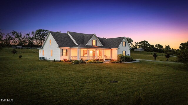 1905 Martin Rd, Limestone, TN 37681 - rear view of house with a lawn and a porch