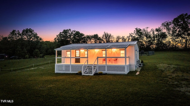 1905 Martin Rd, Limestone, TN 37681 - back of house featuring a yard and metal roof