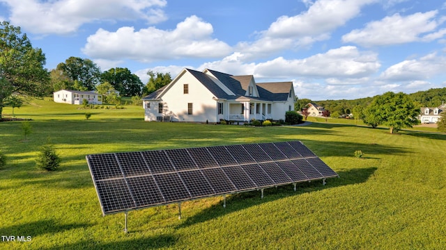 1905 Martin Rd, Limestone, TN 37681 - view of home's exterior featuring ground mounted solar panels and a yard