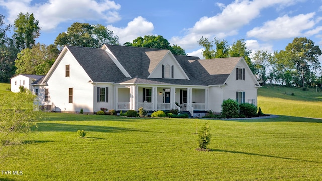 1905 Martin Rd, Limestone, TN 37681 - view of front of home with covered porch and a front yard